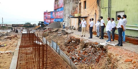 5T Secretary VK Pandian speaks to Collector Balwant Singh while reviewing the progress of Swargadwar redevelopment work in Puri. (Photo| EPS)