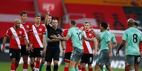 Everton's Lucas Digne (C)Â is shown a red card by the referee after a foul on Southampton's Kyle Walker-Peters during an EPLÂ match at the St. Mary's Stadium. (Photo | AP)