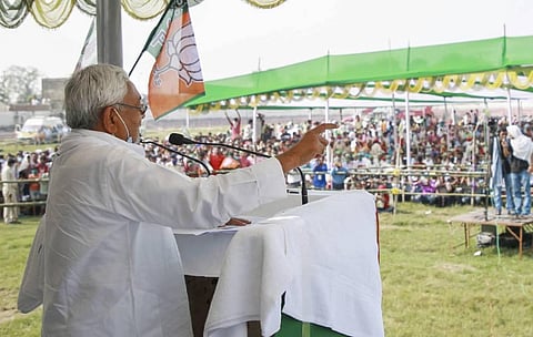 Bihar Chief Minister Nitish Kumar addresses a gathering during an election meeting at Benipur in Darbhanga district Sunday Oct. 25 2020. (Photo | PTI)