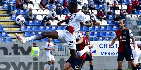 Crotone's Simeon Tochukwu Nwankwo in action during a Serie A match as supporters watch from the stands. (Photo | AP)