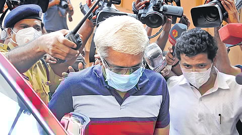 M Sivasankar enters the ED office in Kochi after being taken into custody by the central agency on Wednesday | A Sanesh