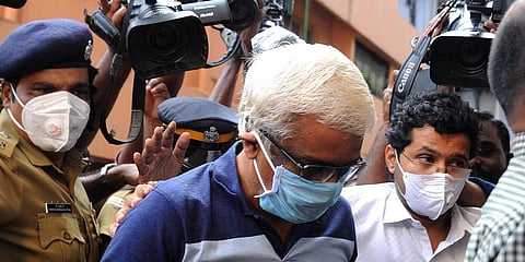 M Sivasankar enters the ED office in Kochi after being taken into custody by the central agency. (Photo | A Sanesh, EPS)