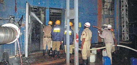 Firefighters battle flames at the KPCL power plant, which witnessed a gas turbine blast, at Yelahanka in Bengaluru on Friday | Express