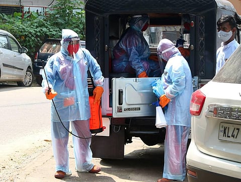 Cleaning volunteers arrive at Mananchira in Kozhikode on Thursday. There are many such groups who play a vital role in the fight against Covid-19 in Kerala | TP Sooraj