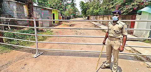 A cop guards a containment zone in Bhubaneswar. (File Photo | Irfana, EPS)