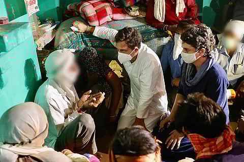 Congress leaders Priyanka Gandhi Vadra and Rahul Gandhi meet the family members of a 19-year-old Dalit woman who died after being allegedly raped two weeks ago. (Photo | PTI)