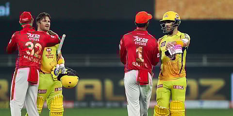 CSK being congratulated by KXIP after winning an IPL 2020 match at Sharjah Cricket Stadium. (Photo| PTI)
