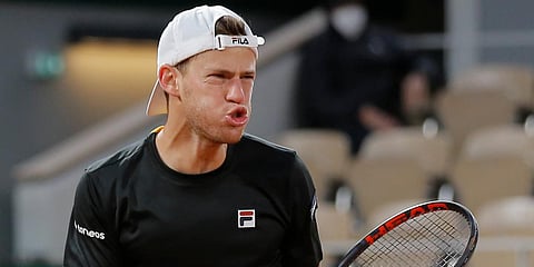Argentina's Diego Schwartzman clenches his fist after scoring a point against Austria's Dominic Thiem in a French Open match. (Photo| AP)