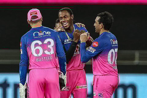 Rajasthan Royals player Jofra Archer celebrates the wicket of Kolkata Knight Riders batsman Shubman Gill during the Indian Premier League 2020 cricket match, at Dubai. (Photo | PTI)