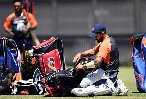 India's captain Virat Kohli packs up his cricket kit during a training session in Perth. (File photo | AFP)