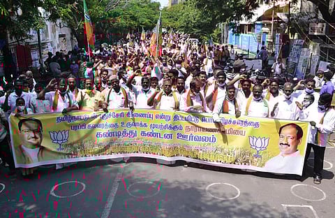 The BJP delegation marching towards the Raj Nivas (Photo | EPS)