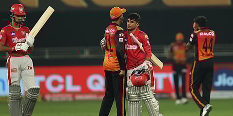 Kings XI Punjab and Sunrisers Hyderabad greet each other after the IPL 2020 match in Dubai. (Photo| PTI)