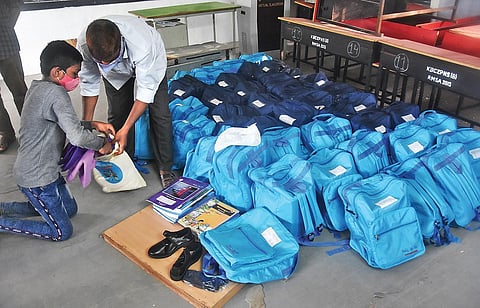 Vidya Kanuka kits being arranged for distribution at Koneru Basavaiah Chowdary ZP High School in Vijayawada. (Photo | P Ravindra Babu, EPS)