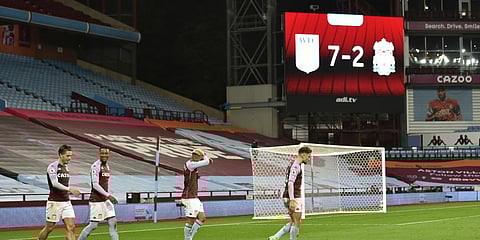 Aston Villa's Jack Grealish (L) celebrates after scoring his side's seventh goal during the English Premier League match vs Liverpool at the Villa Park stadium. (Photo| AP)