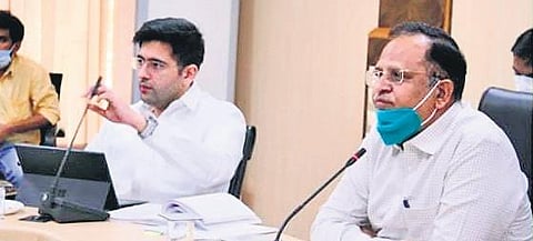 DJB chairman Satyendar Jain alongside Raghav Chadha at the meeting. (Photo | Twitter)