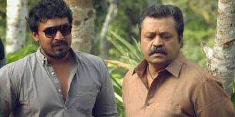 Nithin Renji Panicker (L) and Suresh Gopi on the set of Kaval. (Photo| Cinema Express)