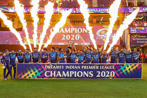 Mumbai Indians team pose with the winners trophy after winning the final cricket match of the Indian Premier League IPL T20. (Photo | PTI)