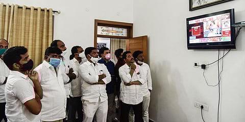TRS workers watching the Dubakka bypoll results in television at TRS Bhavan. (Photo| Vinay Madapu, EPS)