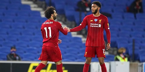 Liverpool's Joe Gomez (R) with Mohamed Salah (Photo | AP)