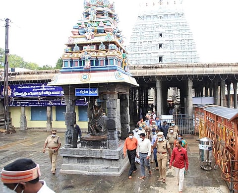 Top officials of district administration and police inspecting the Arunachaleswarar temple (Photo | EPS)