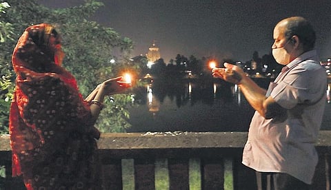 A couple offering prayer on the occasion of Diwali in Bhubaneswar | Express