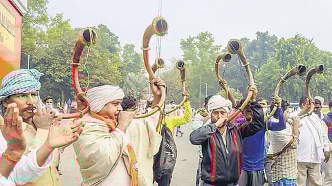 BJP and JD-U supporters celebrate the oath-taking of Nitish Kumar as Bihar Chief Minister, in Patna on Monday | PTi