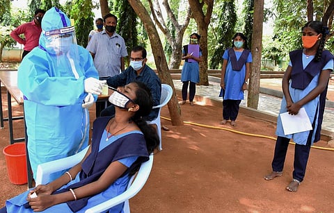 A medical staff collecting swab samples. (Photo | Madhav K, EPS)