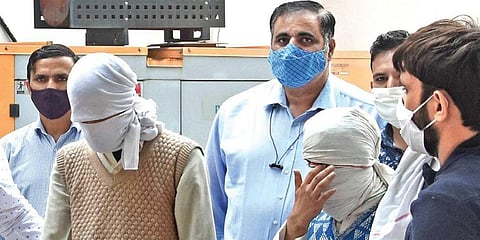 Two suspected militants Abdul Latif and Ashraf Khatana, who were held on Monday night, at Anti-Terror Squad office in Janakpuri on Tuesday. (Photo | PTI)