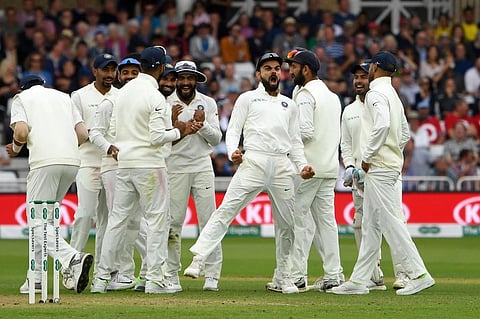 India's captain Virat Kohli (C) celebrates. (Photo | AFP)