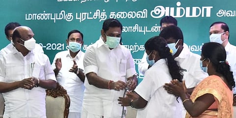 TN Chief Minister Edappadi K Palaniswami hands medical admission allotment to A Monisha under the special quota students of Govt schools. (Photo | P Jawahar, EPS)