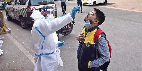 A commuter undergoes test in Noida on Wednesday. (Photo | Parveen Negi, EPS)