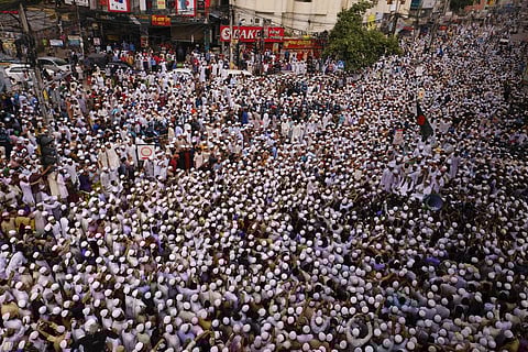 Bangladeshi Muslims protesting the French president’s support of secular laws allowing caricatures of the Prophet Muhammad march to lay siege on the French Embassy in Dhaka. (Photo | AP)