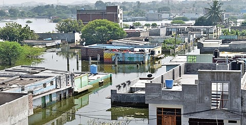 Many houses still remain under water near Osman Nagar tank in Hyderabad; S SENBAGAPANDIYAN