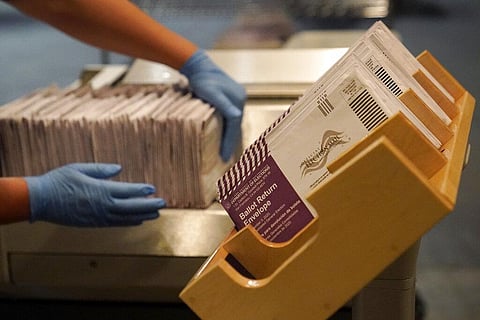 Envelopes containing ballots are shown at a San Francisco Department of Elections at a voting center in San Francisco. (Photo | AP)