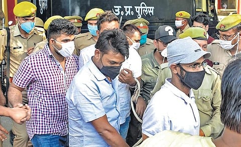 Journalist Siddique Kappan (right) (Photo | PTI)