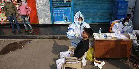 Health workers conduct COVID-19 testing in New Delhi. (File photo| Shekhar Yadav, EPS)