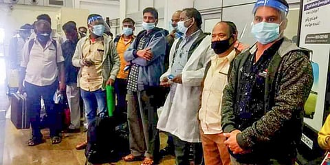 The Tamil labourers from Kuwait at Tiruchy airport.(Photo| EPS)