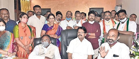 Sarve Satyanarayana seen with BJP State president Bandi Sanjay Kumar