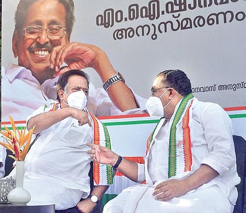 Opposition leader Ramesh Chennithala and UDF convener M M Hassan sharing a light moment at the M I Shanavas memorial meeting in T’Puram on Saturday | Vincent Pulickal