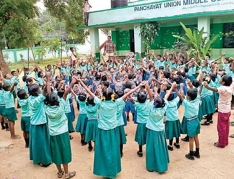 Students gathered on the premises of Puraiyur Panchayat Union Middle School