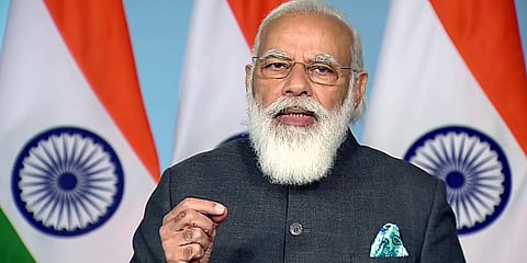 Prime Minister Narendra Modi addresses after inaugurating multi-storeyed flats for MPS, located at Dr BD Marg in New Delhi. (Photo| ANI)