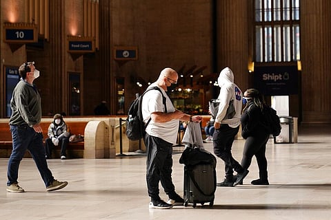 Travelers make their way through the 30th Street Station ahead of the Thanksgiving holiday, Friday, Nov. 20, 2020, in Philadelphia. (Photo | AP)