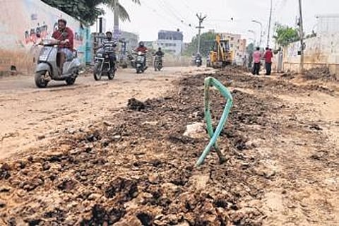 Dug-up road invites muddy mishaps