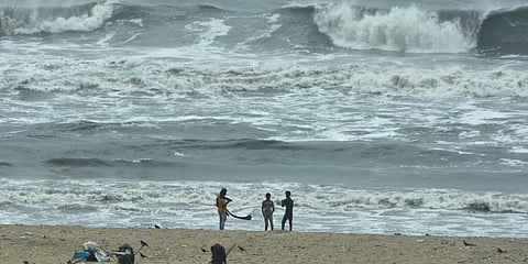 Rough tides with drizzling rain, and dark clouds loom near Marina as Cyclone Nivar approaches the shore. (Photo | Ashwin Prasath, EPS)