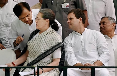 Congress President Sonia Gandhi talks with party leader Ahmed Patel as Vice President Rahul Gandhi and Janardhan Dwivedi look on. (File | PTI)