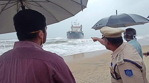 There is a lot of heavy machinery still on the vessel, including rearward extending suction pipes, dredging pumps, transportation tubes, overflow channels and degassing installation.