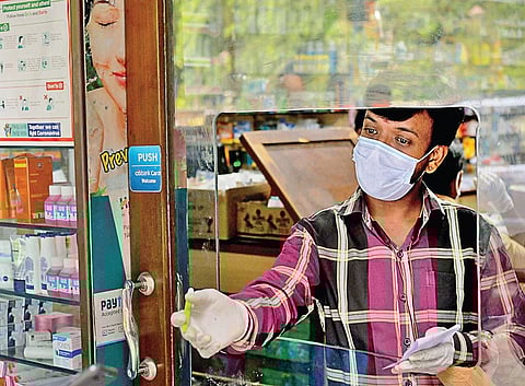 A pharmacist attends to customers| (File Photo | EPS)