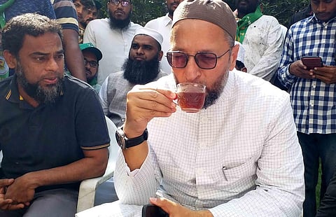 AIMIM MP Asaduddin Owaisi taking a break while sipping Black Tea during his GHMC elections campaing in Hyderabad bon Wednesday.