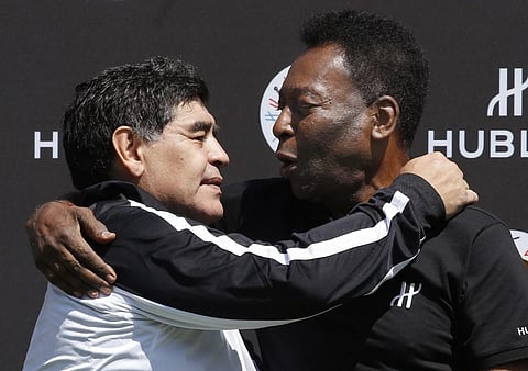 Diego Maradona (L) and former Brazilian footballer Pele. (Photo | AFP)