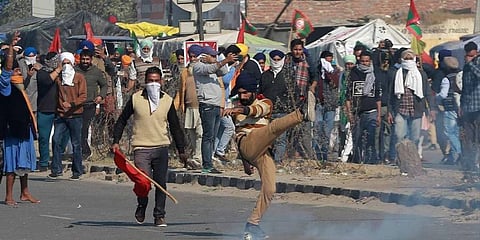 Delhi Police use tear gas to disperse agitating farmers who had gathered at Singhu border as part of their Delhi Chalo protest. (Photo | Shekhar Yadav, EPS)